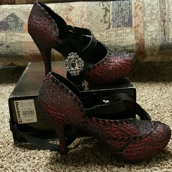 BKE Sole's brand new in box size 8.5 with bling