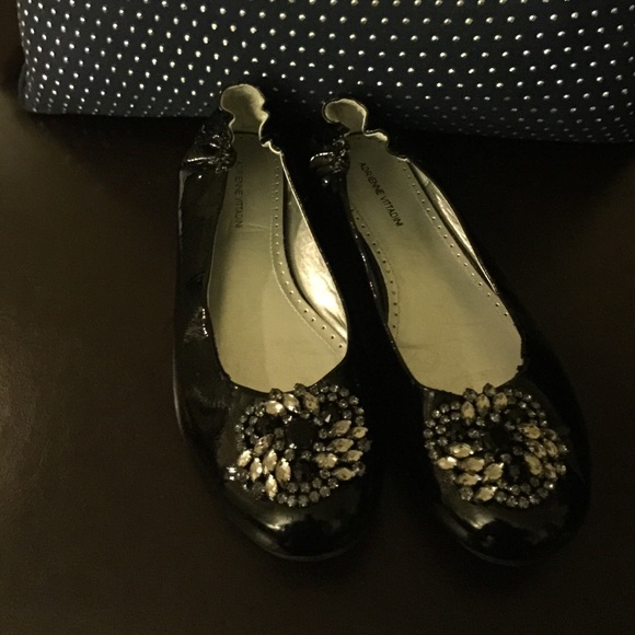 Adrienne Vittadini black patent leather flats.