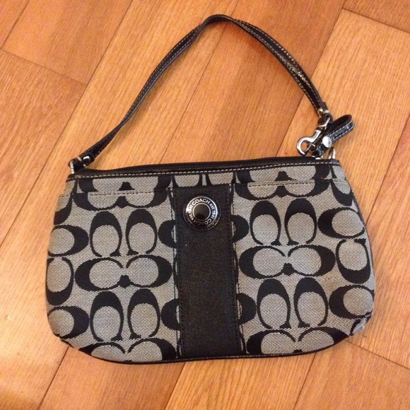 Black and grey Coach wristlet