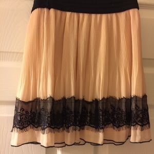 Peach skirt and black lace trim