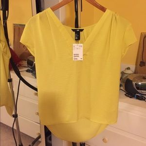 Bright yellow blouse