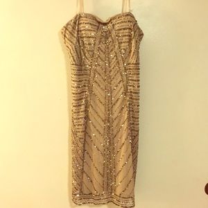 Sequin strapless  dress.