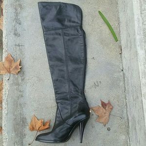 Shinning thigh high leather boots