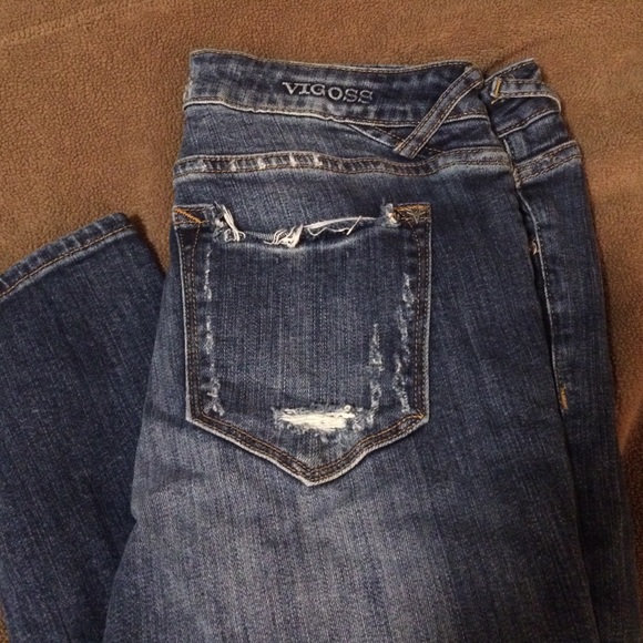 Distressed blue skinny jeans