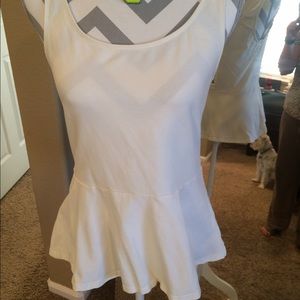 Peplum tank with zipper back