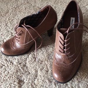 Brown wing tip heels