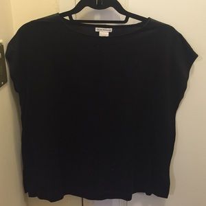 Black top with 100% leather trim on shoulders.