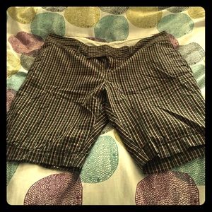 Plaid Bermuda shorts.