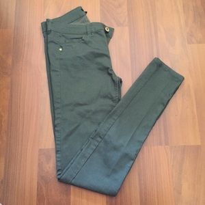 Green H&M skinny jeans.