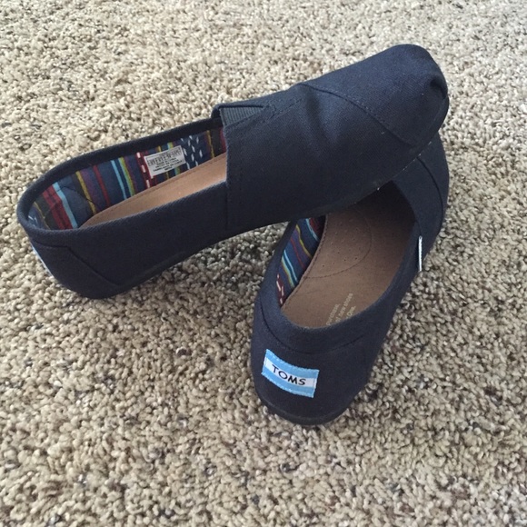 TOMS size 8.5. Worn three or four times!