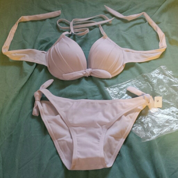 Small extra small swimsuit NEVER worn. Asian size.