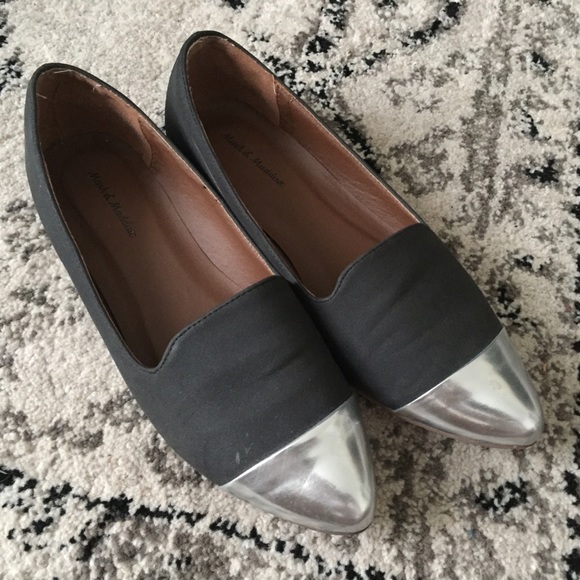 Pair of Black Cap Toe Flats
