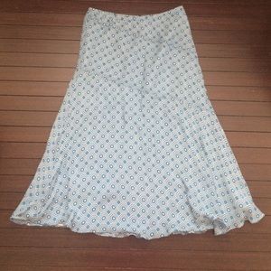 Pretty and Flirty Fully lined mid-length skirt.