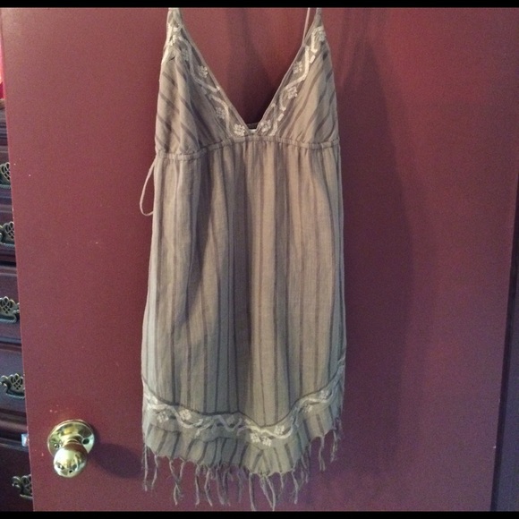 Tan cover up or top.