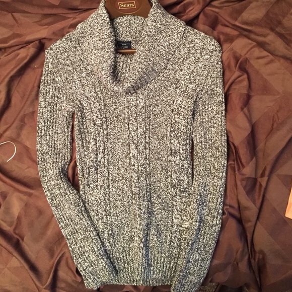 Gray and white knitted sweater