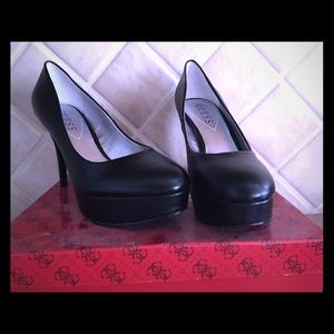 Black platform pumps