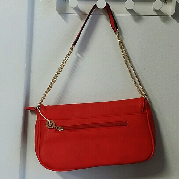 Red purse with gold chain strap. Very cute. - Picture 2 of 8