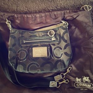 Black and silver Coach Poppy purse