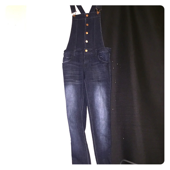 Dark blue stone washed overalls.