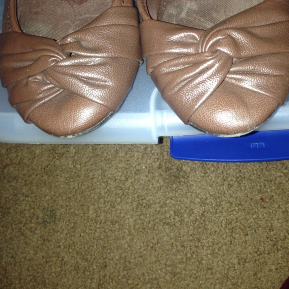 Brown leather flats
