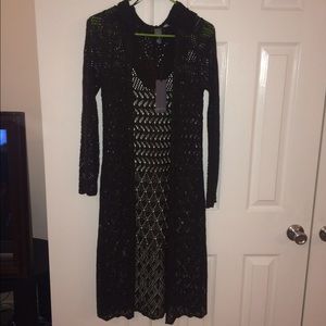 Francesca's long sweater.