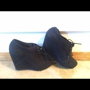 Black wedge booties