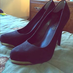 Lightly worn high heel shoes