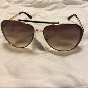 Michael Kors sunglasses. (On hold till next week )