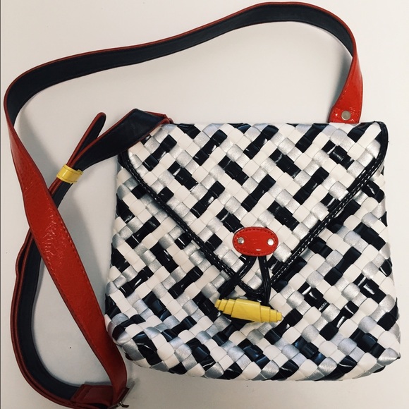 Water resistant micra-pac cross body