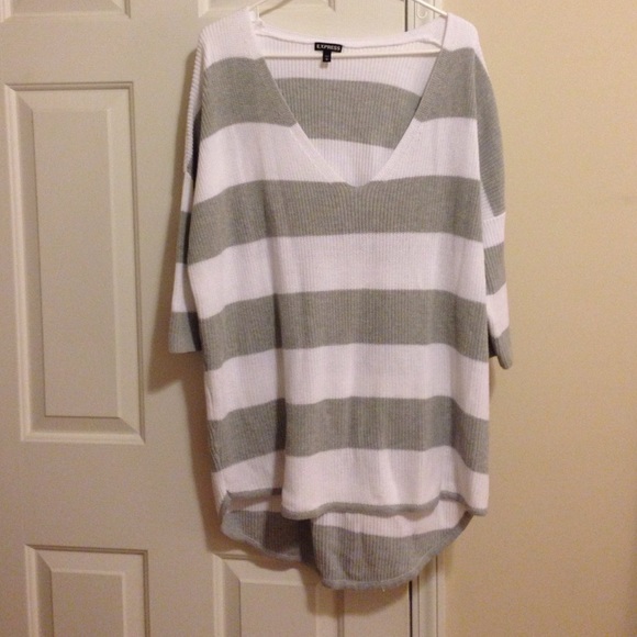 Long gray and white striped sweater.