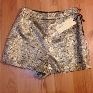 Gold and black shorts Size Small NWT