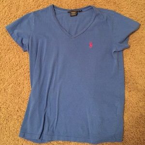 Blue polo pink horse logo