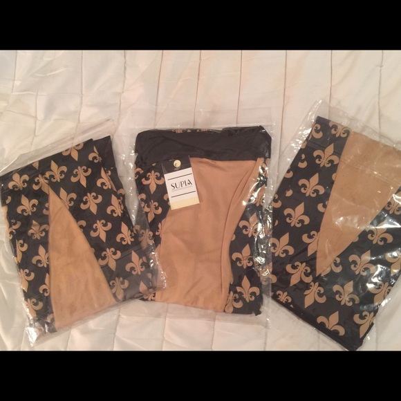 Leggings!  Fleur de Lis design. U get ALL 3 pairs!