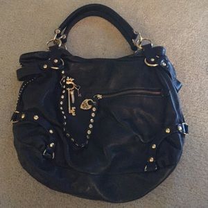 Juicy couture black leather over the shoulder bag
