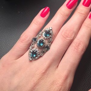 Silver ring. 5 blue crystals without any scratch