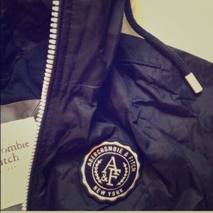 Navy blue hooded wind breaker jacket