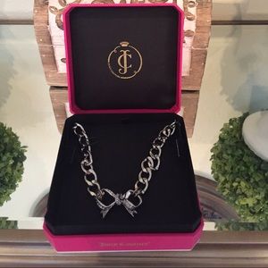 Juicy Couture Silver Bow Necklace. New with tags!!