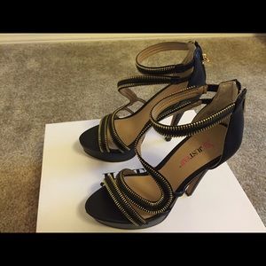 Gold and black heels