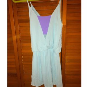 Lush baby blue romper with purple cut out💜