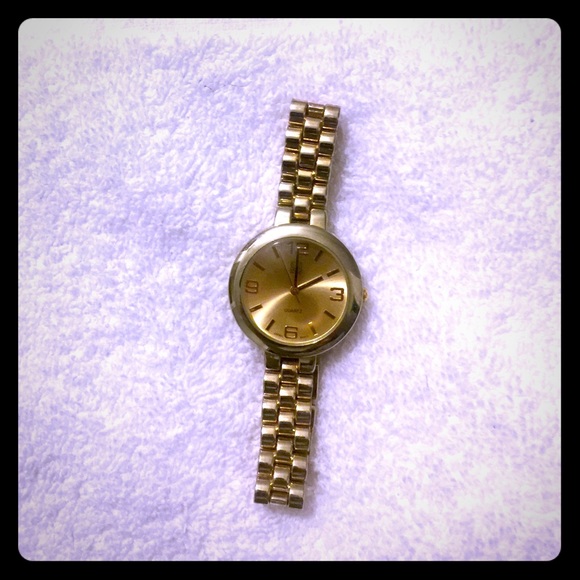 Gold tone watch