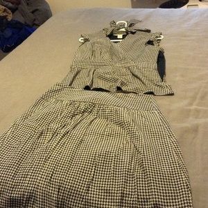 Another chic suit with pleated skirt