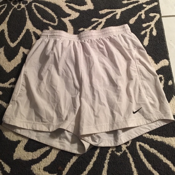 White Nike Dri-Fit shorts.