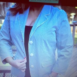 Jacket that is blue with white stripes