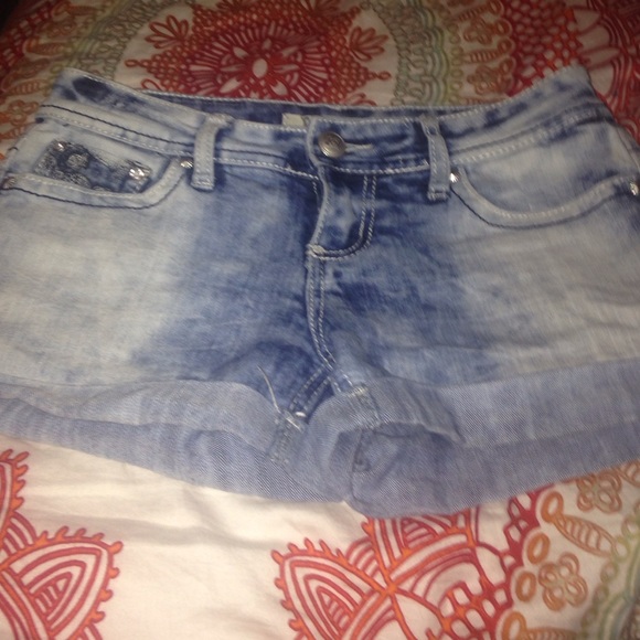 Denim light washed shots with detailed pockets