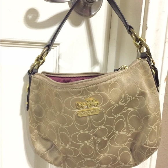 Authentic small coach hobo purse .