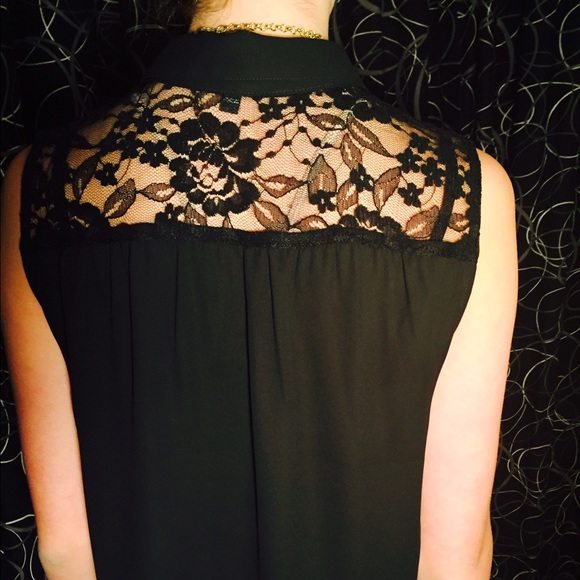 Sheer sleeveless blouse with lace back detail
