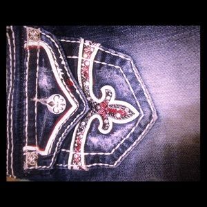 Size 24 Rock revival capris with red stitching