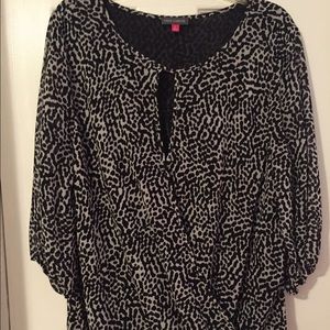 Black and white spotted top