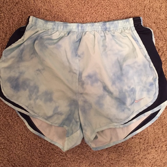 White, navy, light blue Nike running shorts