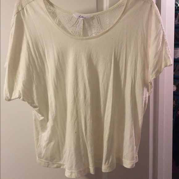 Flowy ivory top with lace detailed back